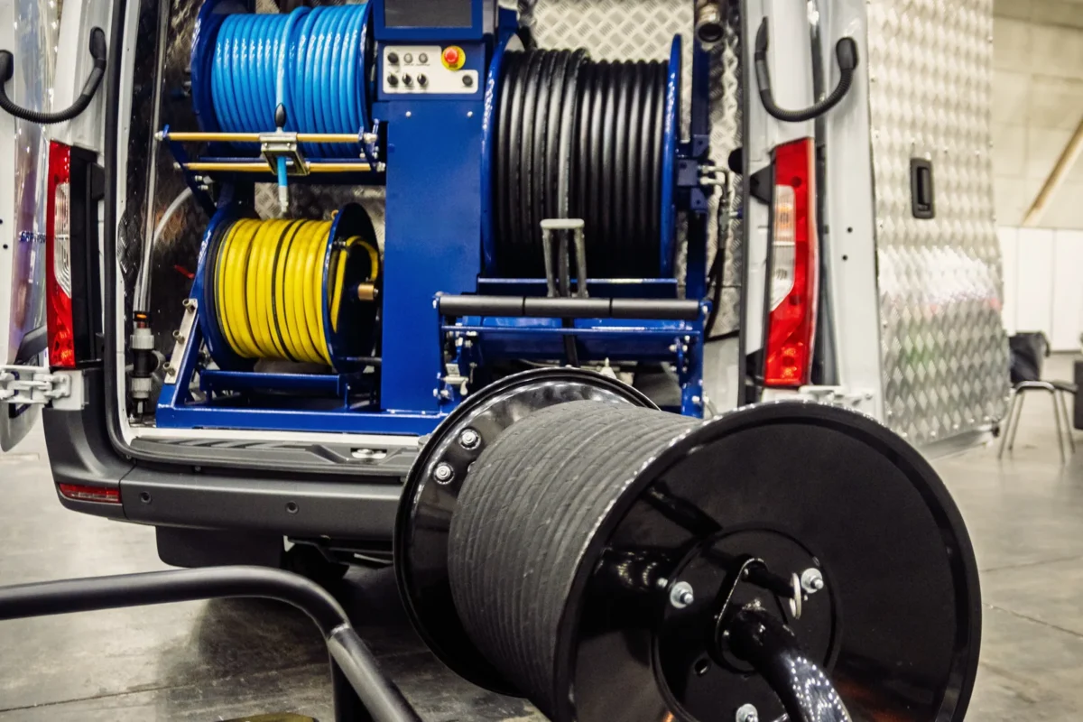 Water-jetting hose reels and equipment fitted inside a service van